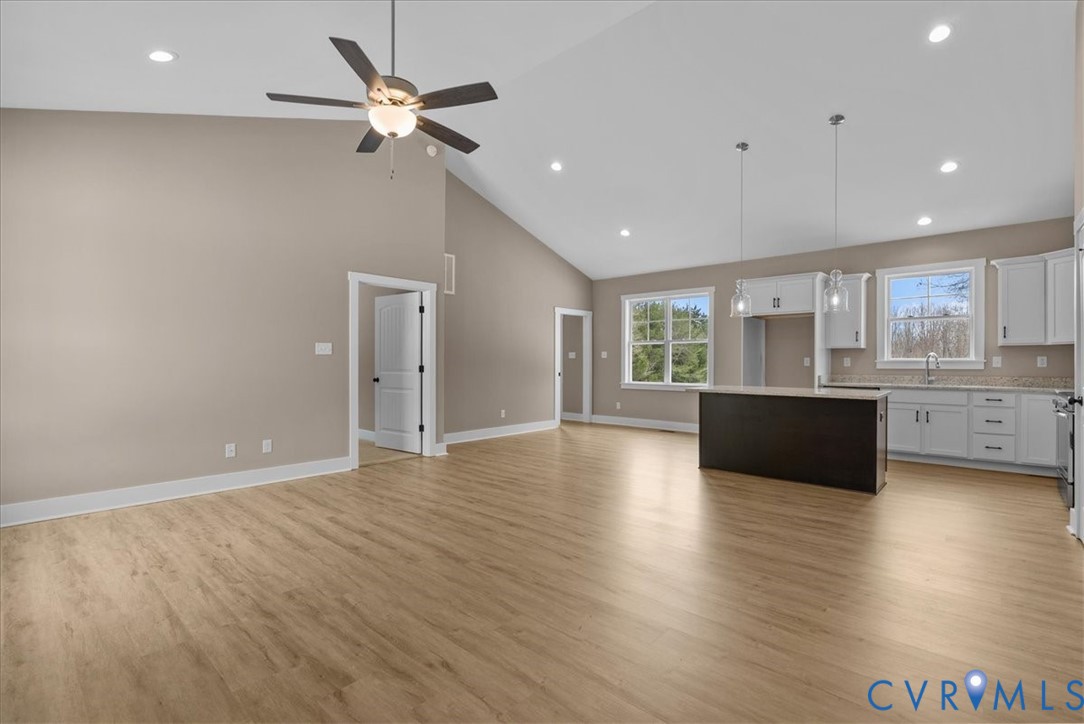 2229 North Terry's Bridge Road Halifax, VA 24558 - Photo 13 of 42 a view of an empty room with a window and wooden floor