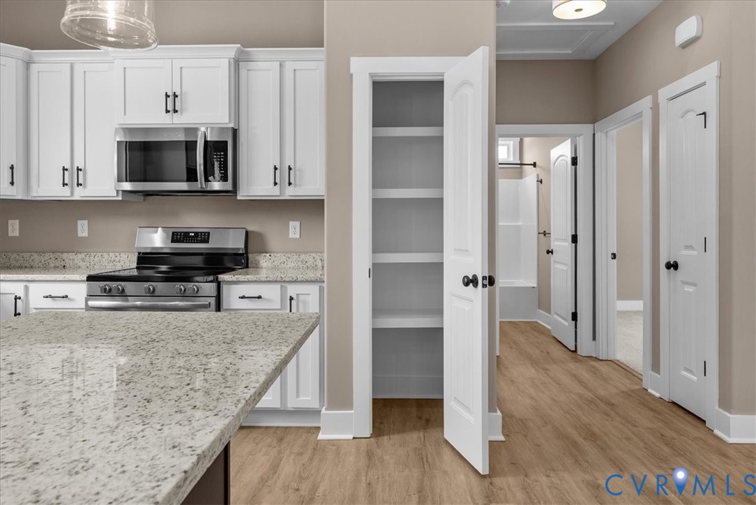 2229 North Terry's Bridge Road Halifax, VA 24558 - Photo 17 of 42 a kitchen with stainless steel appliances granite countertop a refrigerator a stove and a sink