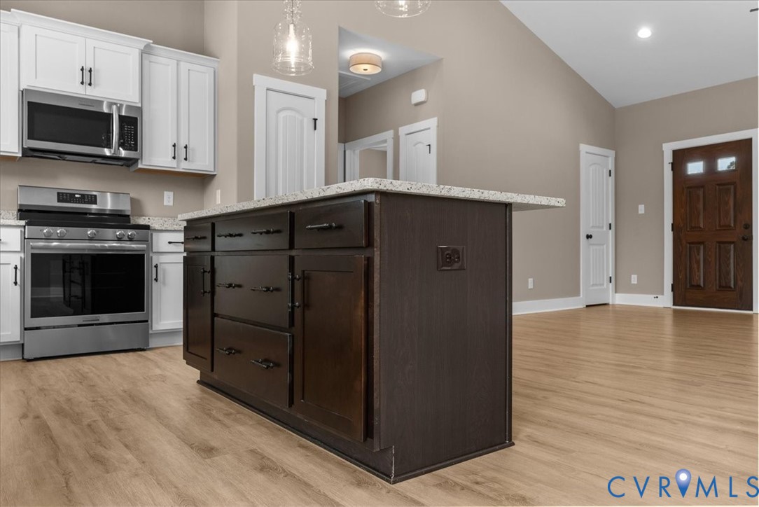 2229 North Terry's Bridge Road Halifax, VA 24558 - Photo 21 of 42 a kitchen with stainless steel appliances granite countertop a refrigerator and a stove