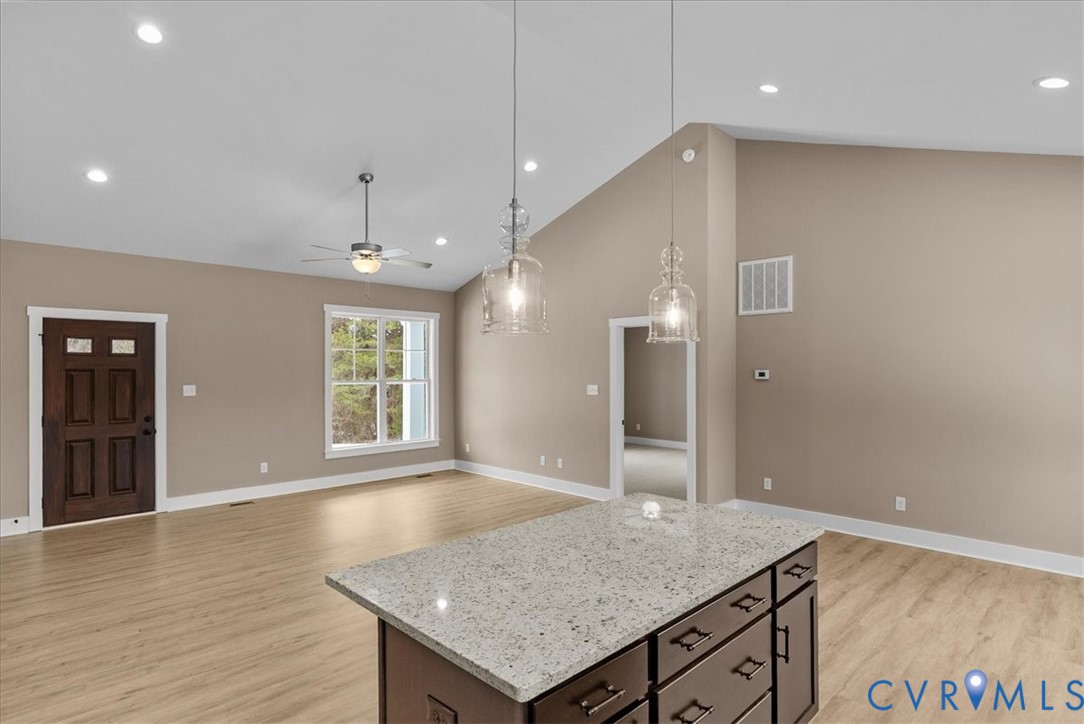 2229 North Terry's Bridge Road Halifax, VA 24558 - Photo 25 of 42 an open kitchen with a table and chandelier