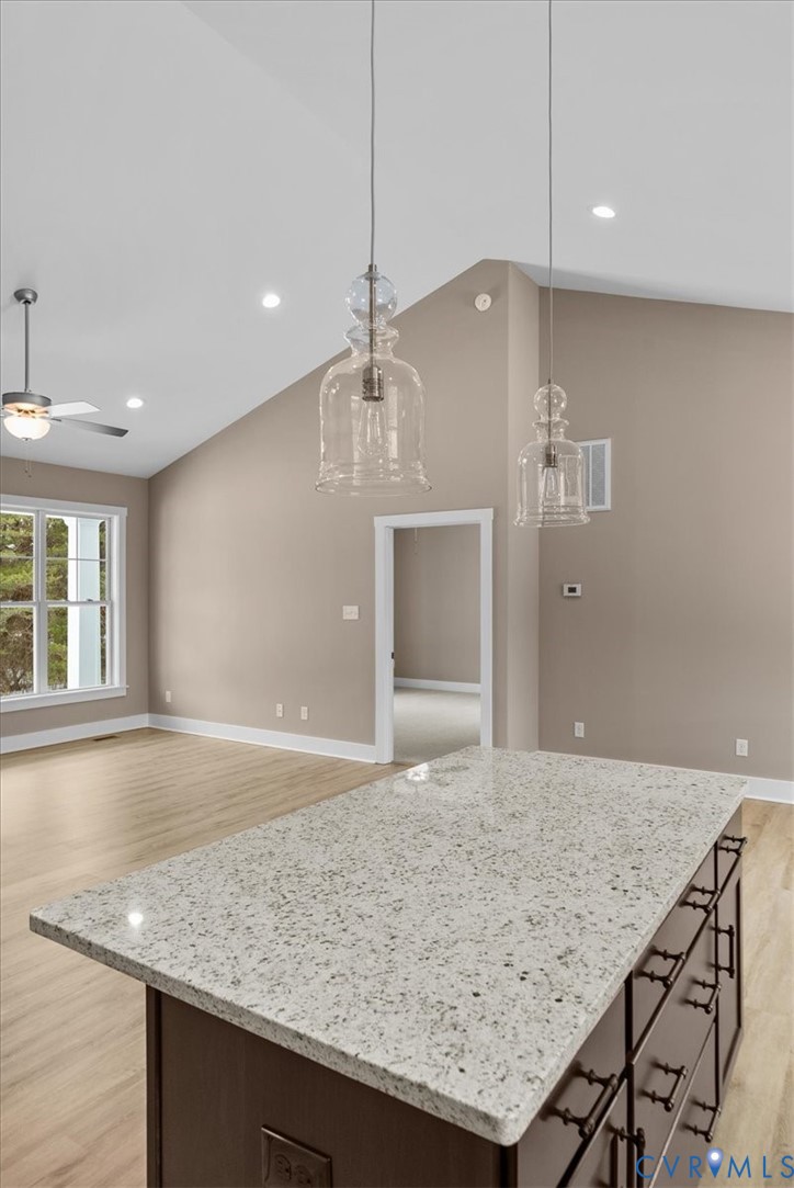2229 North Terry's Bridge Road Halifax, VA 24558 - Photo 27 of 42 a kitchen with kitchen island a sink and wooden floor