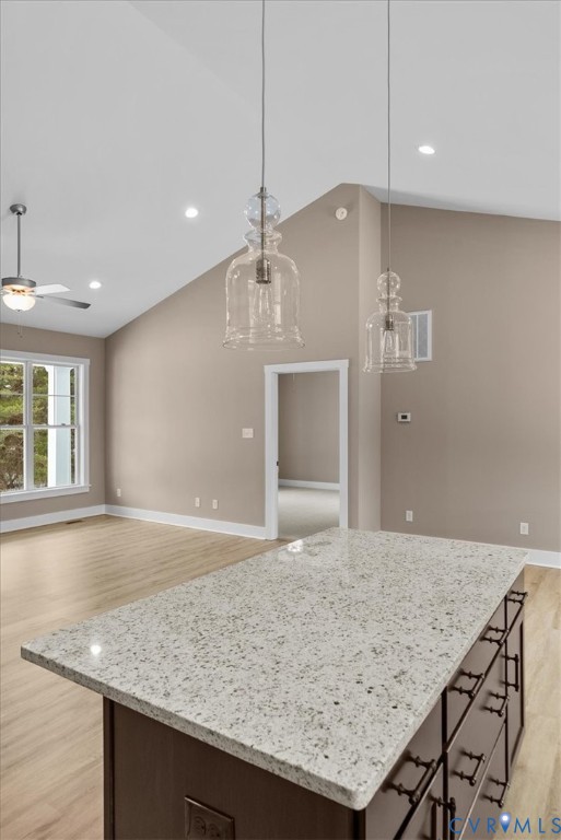 2229 North Terry's Bridge Road Halifax, VA 24558 - Photo 27 of 42 a view of a kitchen with a sink granite counter tops and a ceiling fan