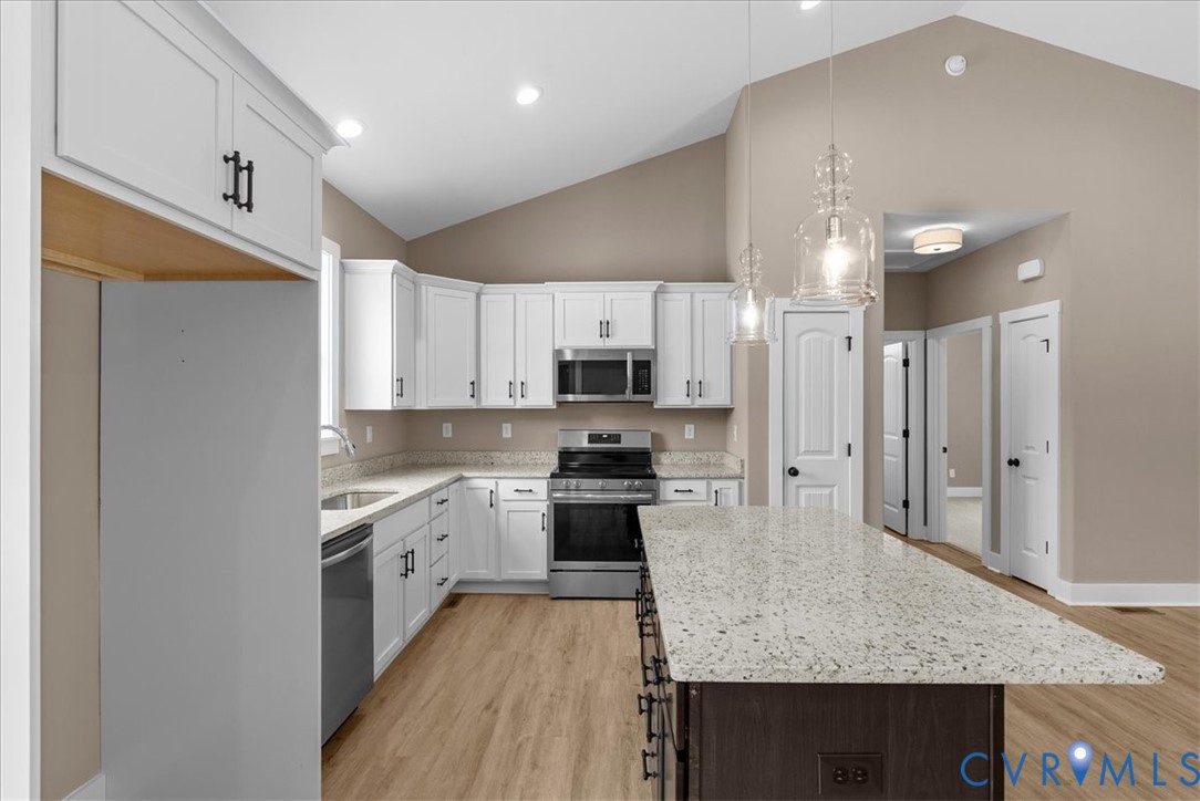 2229 North Terry's Bridge Road Halifax, VA 24558 - Photo 3 of 42 a large kitchen with stainless steel appliances granite countertop a stove and a sink