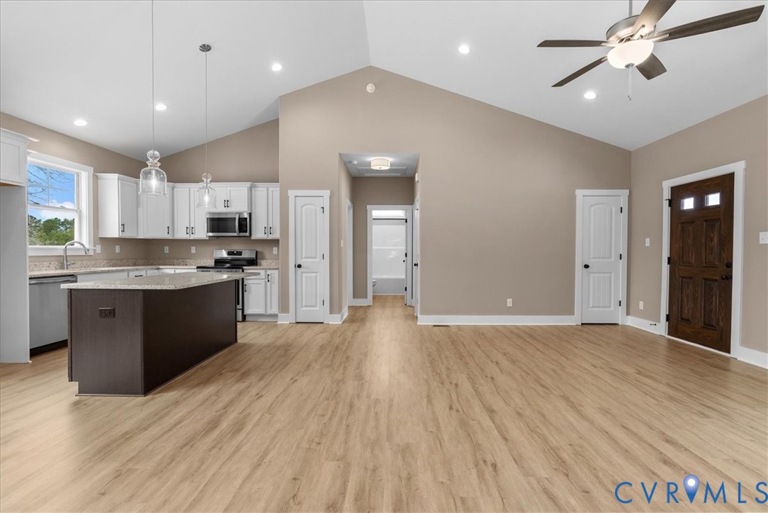 2229 North Terry's Bridge Road Halifax, VA 24558 - Photo 33 of 42 a large kitchen with stainless steel appliances granite countertop a stove a sink and a refrigerator