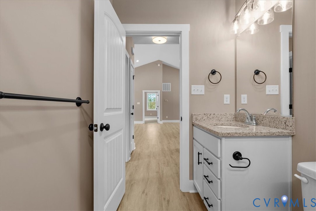 2229 North Terry's Bridge Road Halifax, VA 24558 - Photo 40 of 42 a bathroom with a granite countertop sink a mirror and shower