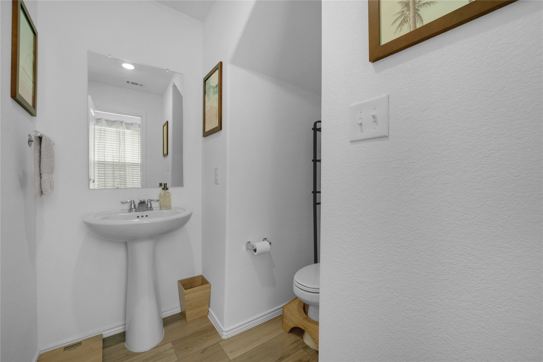 36 Trinity Circle Lockhart, TX 78644 - Photo 10 of 36 a bathroom with a sink toilet and a mirror