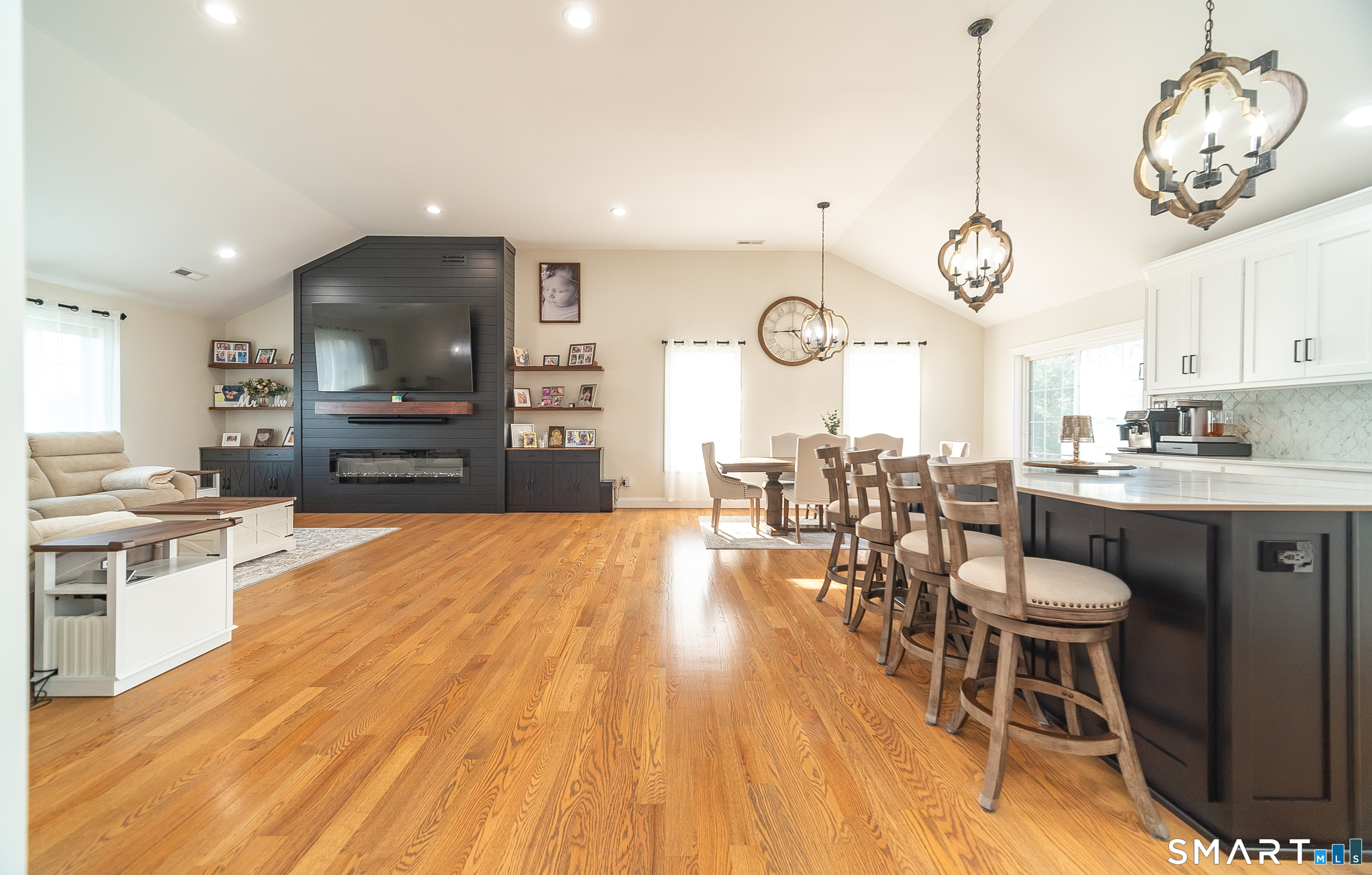 69 Cronin Street Bristol, CT 06010 - Photo 1 of 40 a large kitchen with a table and chairs in it