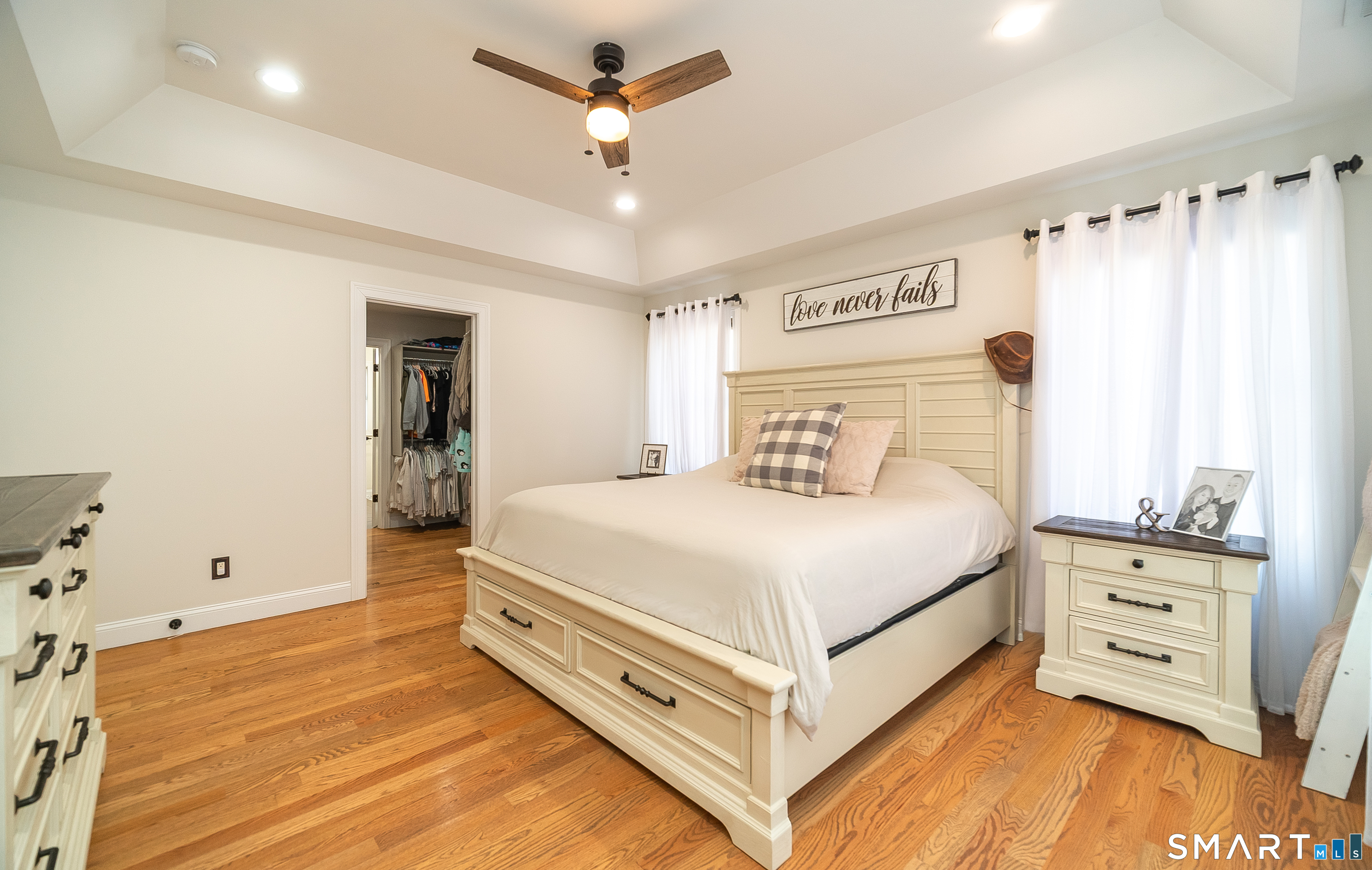 69 Cronin Street Bristol, CT 06010 - Photo 11 of 40 a bed room with a bed and a chair