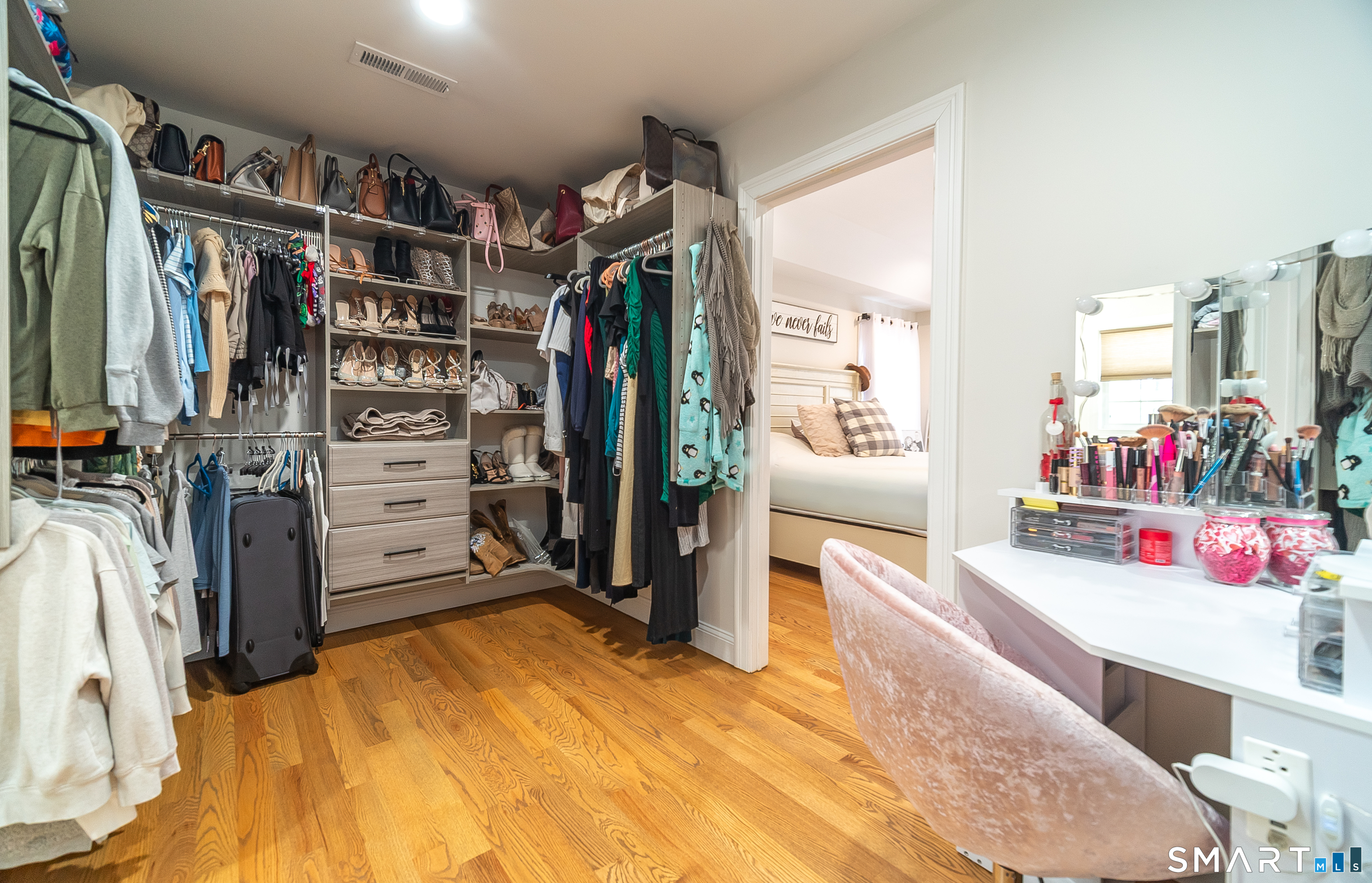 69 Cronin Street Bristol, CT 06010 - Photo 12 of 40 a walk in closet with clothes and shoes