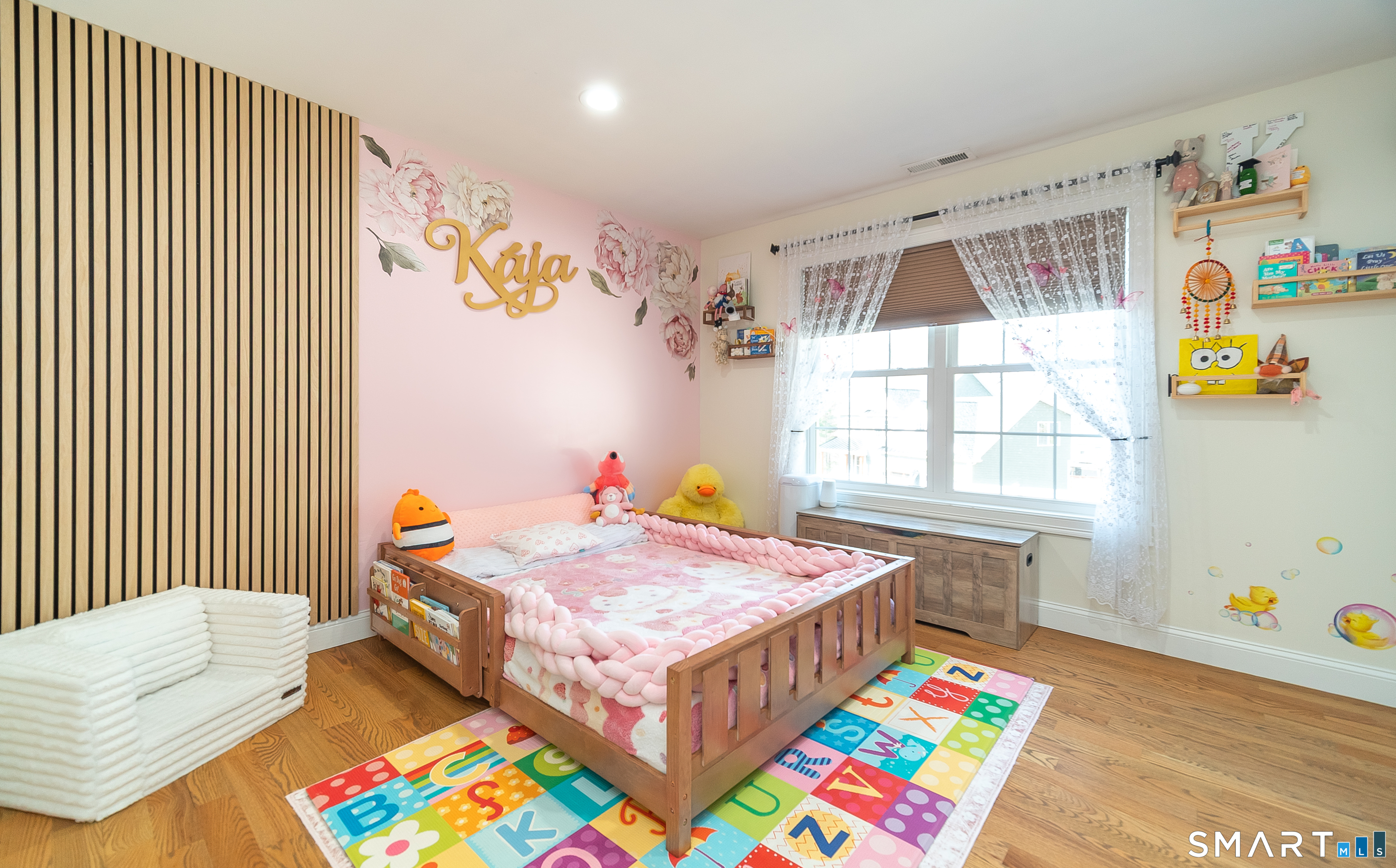 69 Cronin Street Bristol, CT 06010 - Photo 15 of 40 a bed room with a bed and a couch