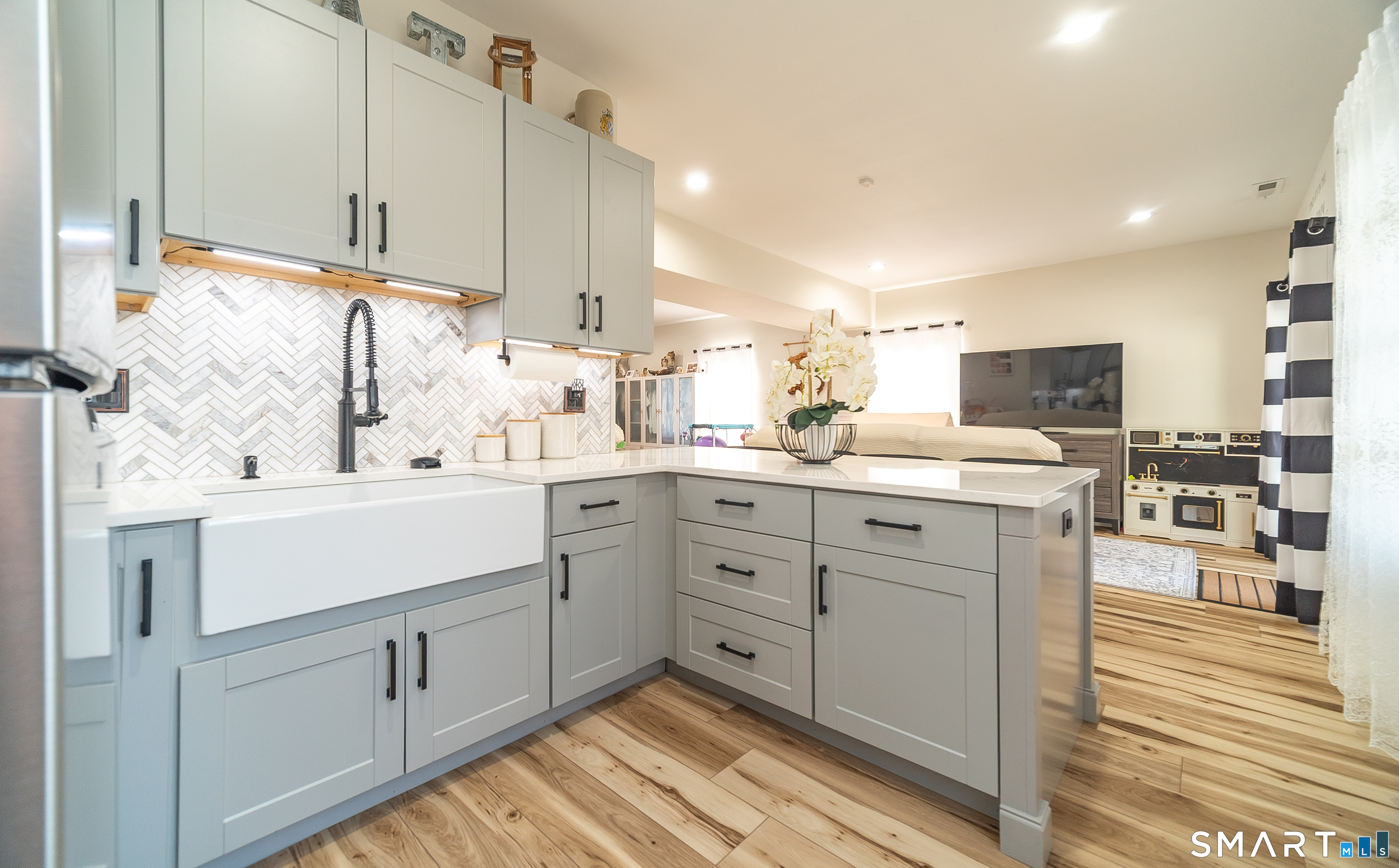69 Cronin Street Bristol, CT 06010 - Photo 25 of 40 a kitchen with cabinets stainless steel appliances and a counter top space