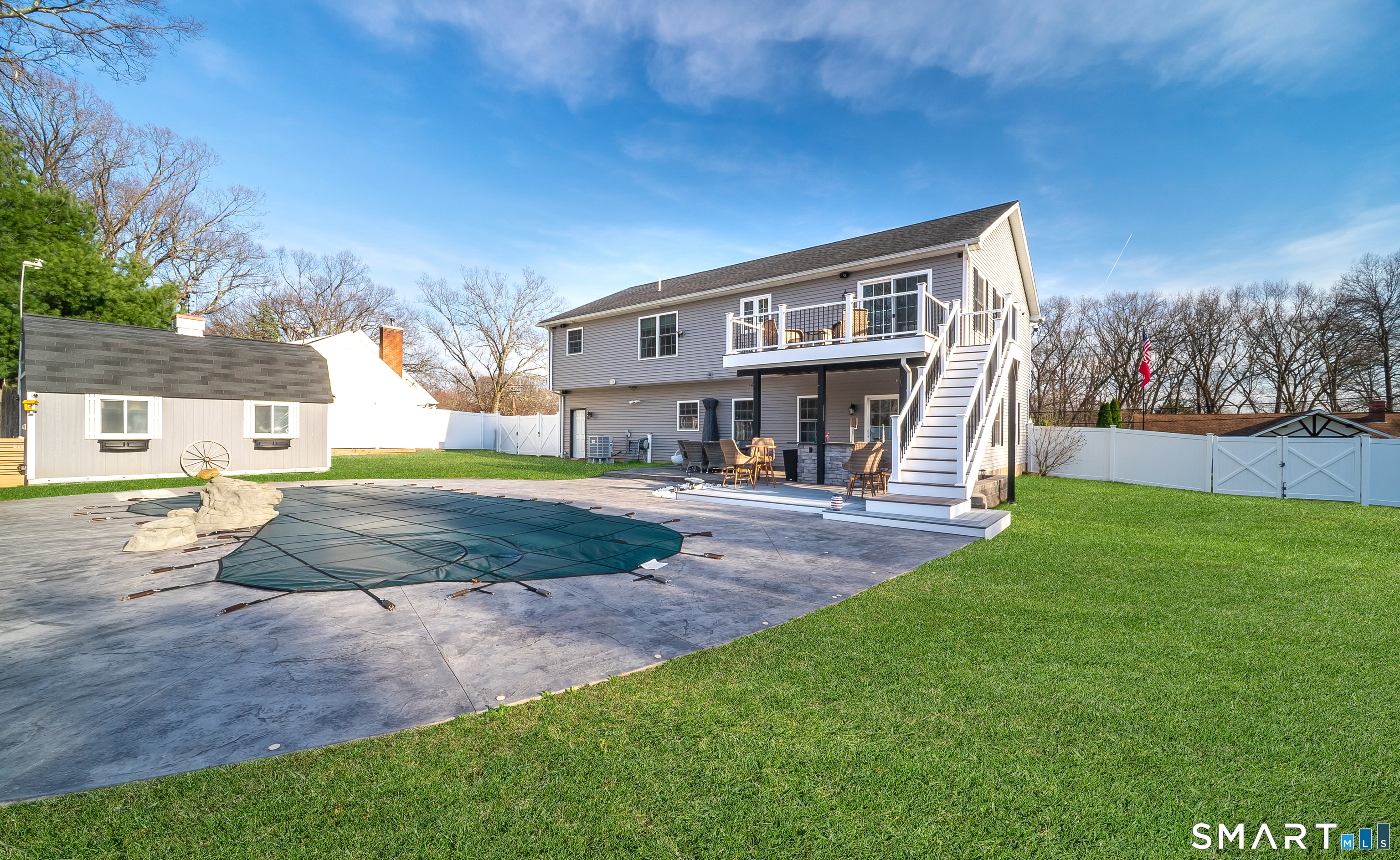 69 Cronin Street Bristol, CT 06010 - Photo 32 of 40 a view of an house with backyard and trees