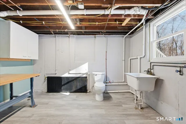 a view of a kitchen with furniture and window