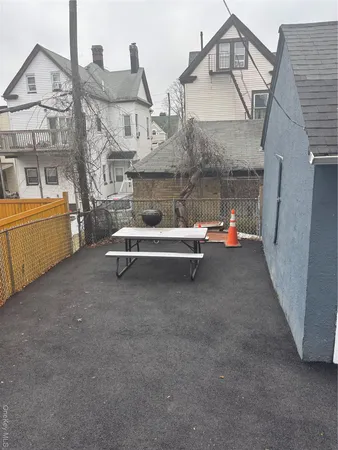 a view of a house with a sink and a tub