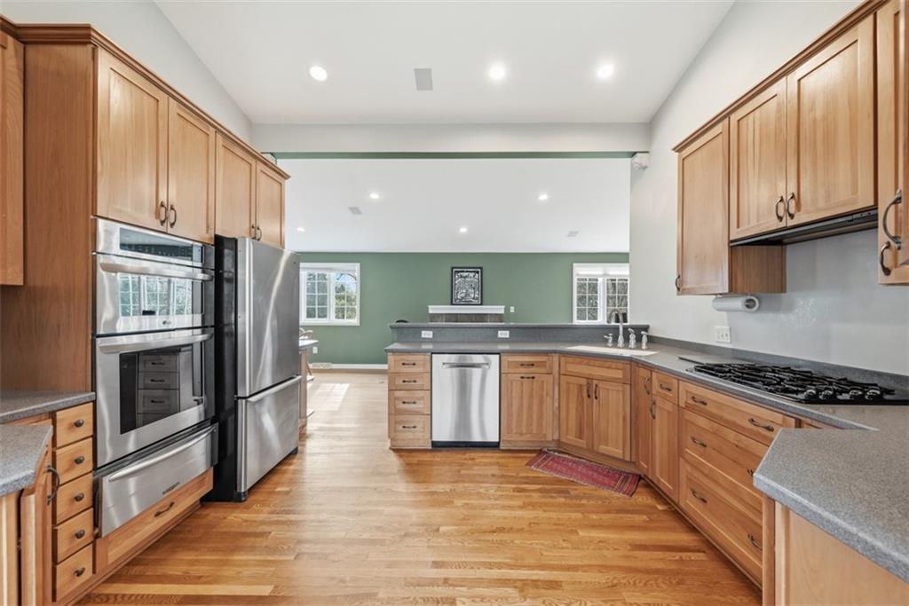 1001 Fox Chapel Road Pittsburgh, PA 15238 - Photo 11 of 50 a kitchen with stainless steel appliances granite countertop a refrigerator sink and stove