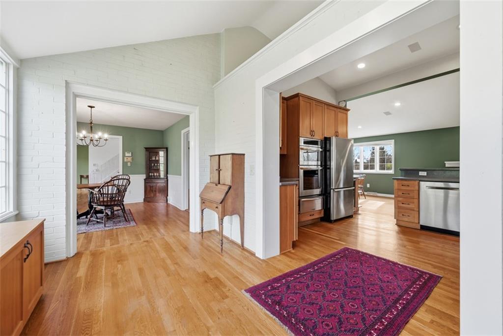 1001 Fox Chapel Road Pittsburgh, PA 15238 - Photo 15 of 50 a living room with furniture and a wooden floor