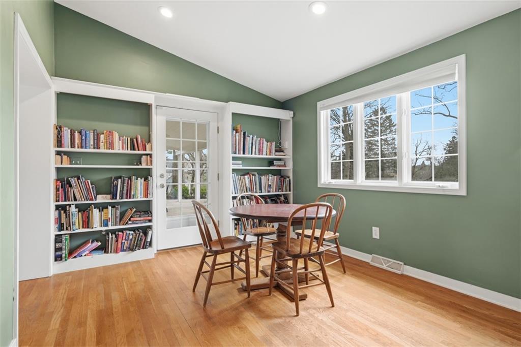 1001 Fox Chapel Road Pittsburgh, PA 15238 - Photo 19 of 50 a view of a livingroom with furniture and a bookshelf