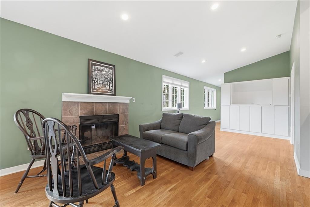 1001 Fox Chapel Road Pittsburgh, PA 15238 - Photo 20 of 50 a living room with furniture and a fireplace