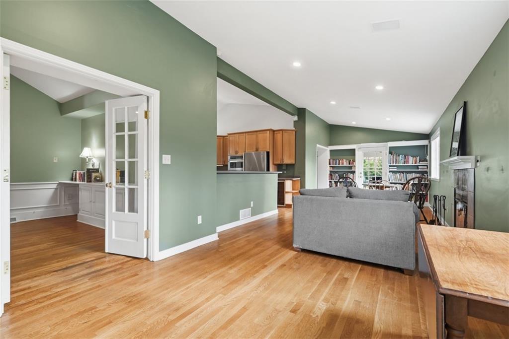 1001 Fox Chapel Road Pittsburgh, PA 15238 - Photo 21 of 50 a living room with furniture and a wooden floor