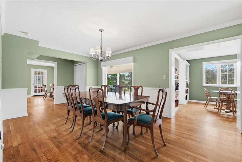 1001 Fox Chapel Road Pittsburgh, PA 15238 - Photo 22 of 50 a view of a dining room with furniture window and wooden floor