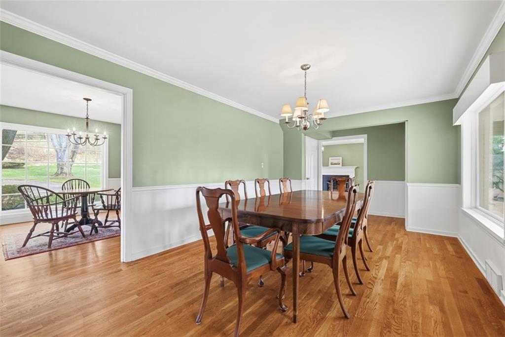 1001 Fox Chapel Road Pittsburgh, PA 15238 - Photo 23 of 50 a view of a dining room with furniture window and wooden floor