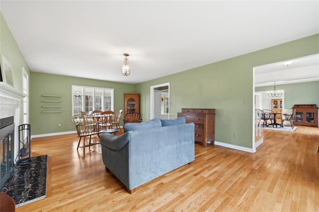 1001 Fox Chapel Road Pittsburgh, PA 15238 - Photo 26 of 50 a living room with furniture and a wooden floor