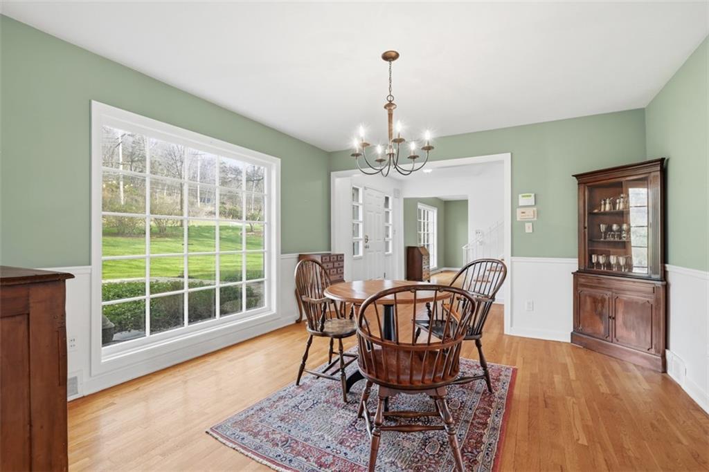 1001 Fox Chapel Road Pittsburgh, PA 15238 - Photo 31 of 50 a view of a dining room with furniture window and wooden floor