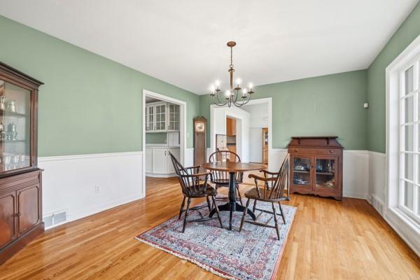 1001 Fox Chapel Road Pittsburgh, PA 15238 - Photo 32 of 50 a view of a dining room with furniture and wooden floor