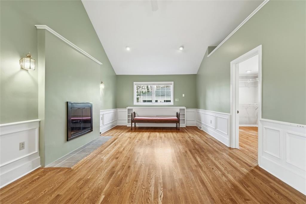 1001 Fox Chapel Road Pittsburgh, PA 15238 - Photo 33 of 50 a spacious bedroom with a bed and a flat screen tv