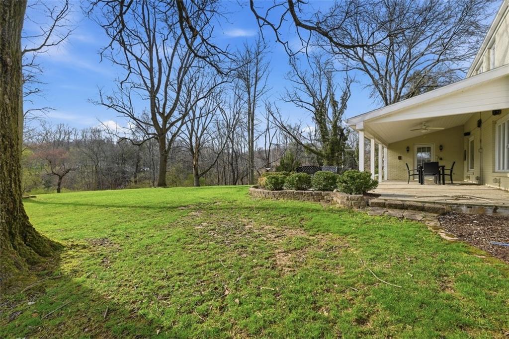 1001 Fox Chapel Road Pittsburgh, PA 15238 - Photo 47 of 50 a view of a house with a yard