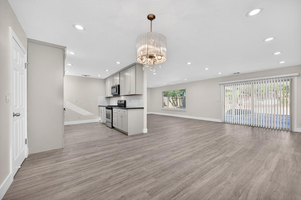 7517 Farmgate Way Citrus Heights, CA 95610 - Photo 14 of 35 a view of a kitchen with wooden floor and window