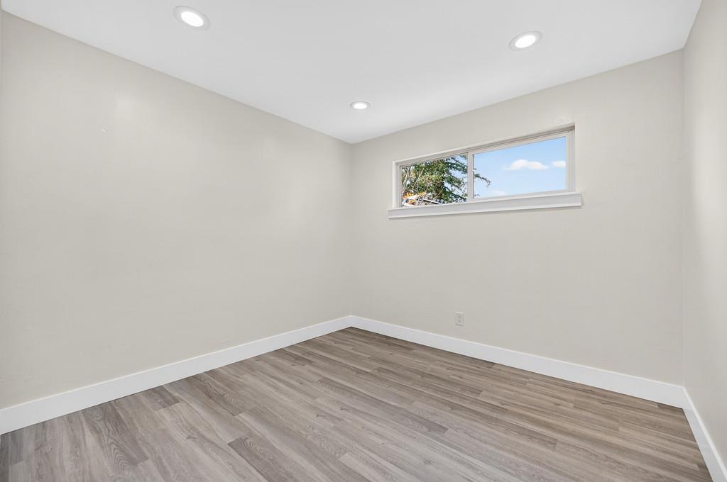 7517 Farmgate Way Citrus Heights, CA 95610 - Photo 21 of 35 a view of empty room with wooden floor and fan