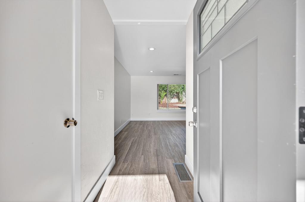 7517 Farmgate Way Citrus Heights, CA 95610 - Photo 6 of 35 a view of a hallway view with wooden floor and staircase
