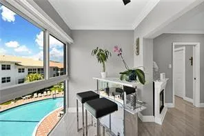 a kitchen with a table and chairs in it