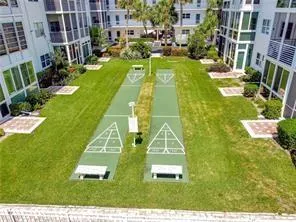 a view of a swimming pool in front of house