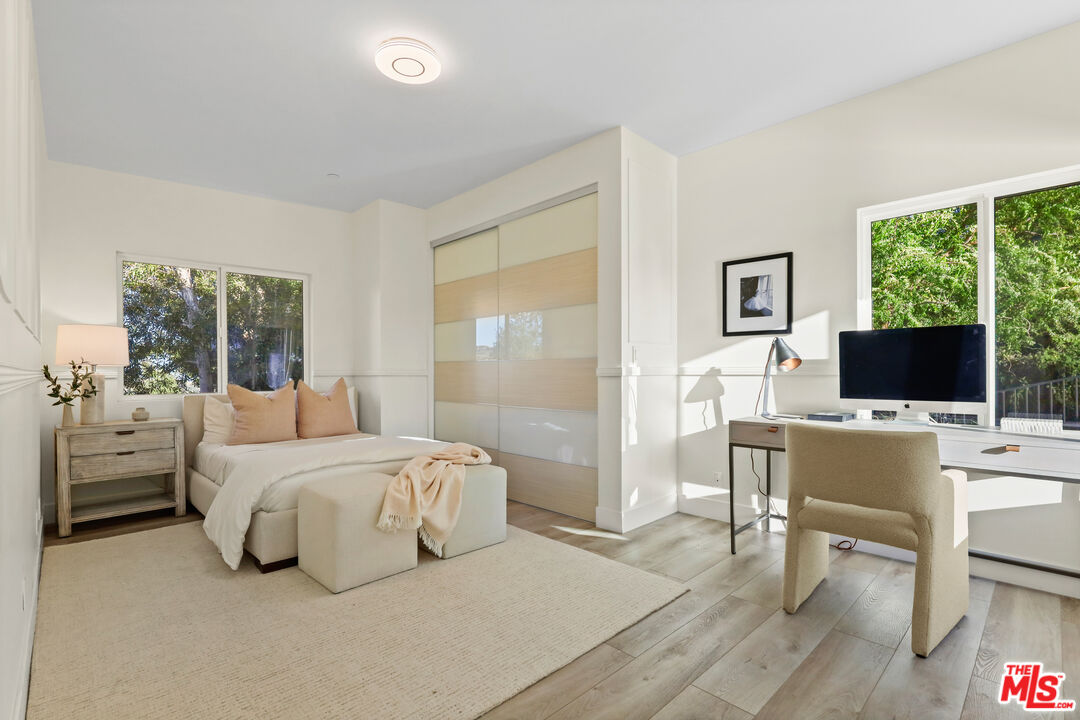 53 Saddlebow Road Bell Canyon, CA 91307 - Photo 52 of 66 a bedroom with a bed and a flat screen tv