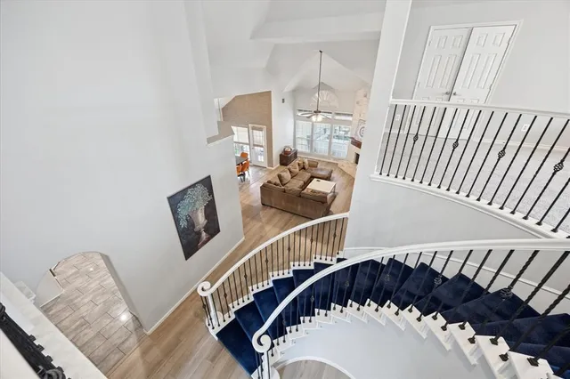 a view of a balcony with wooden floor