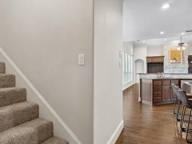 a view of kitchen with dining table and chairs