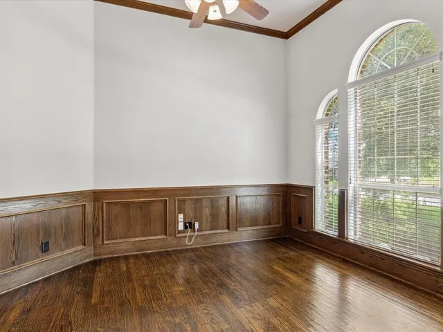a view of a livingroom with wooden floor