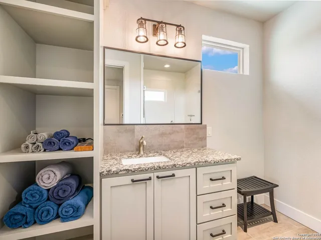 a front view of house with yard and entertaining space