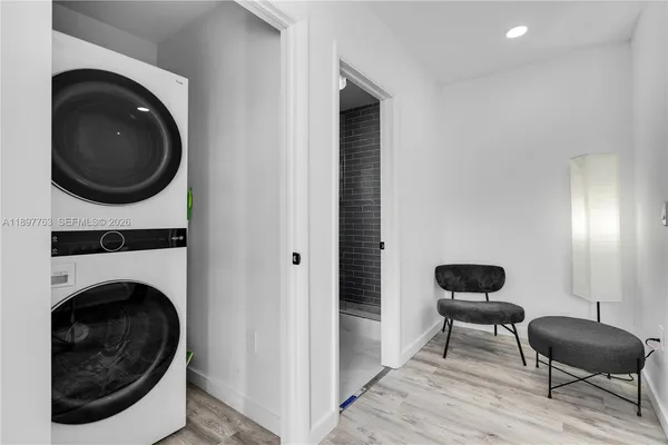 a bathroom with a sink a toilet and a bathtub