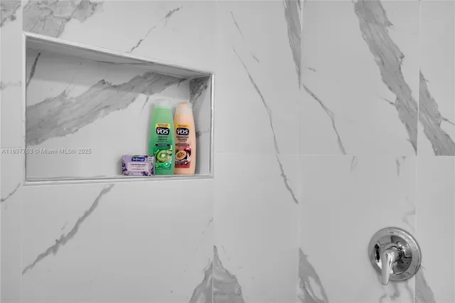 a living room with a couch and a flat screen tv