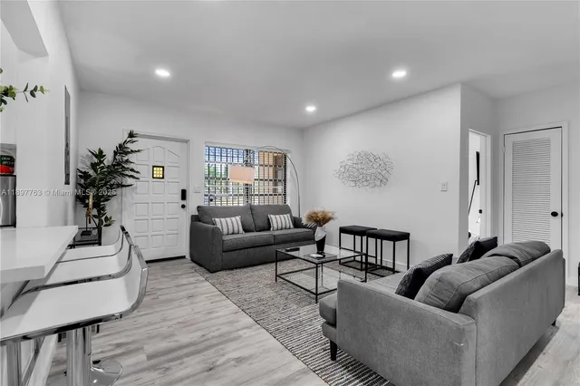 a living room with furniture and a couch