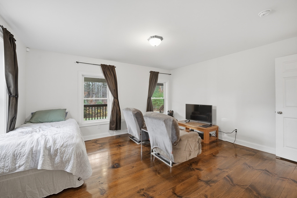 209 Osborne Road Ware, MA 01082 - Photo 15 of 32 a bedroom with a bed furniture and a window