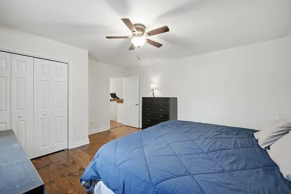 a very nice looking room with a ceiling fan