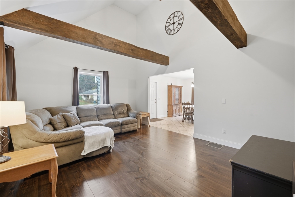 209 Osborne Road Ware, MA 01082 - Photo 6 of 32 a living room with furniture and wooden floor