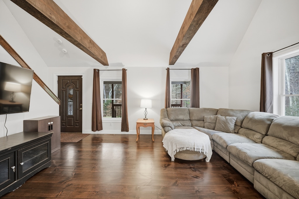 209 Osborne Road Ware, MA 01082 - Photo 8 of 32 a living room with furniture and a flat screen tv
