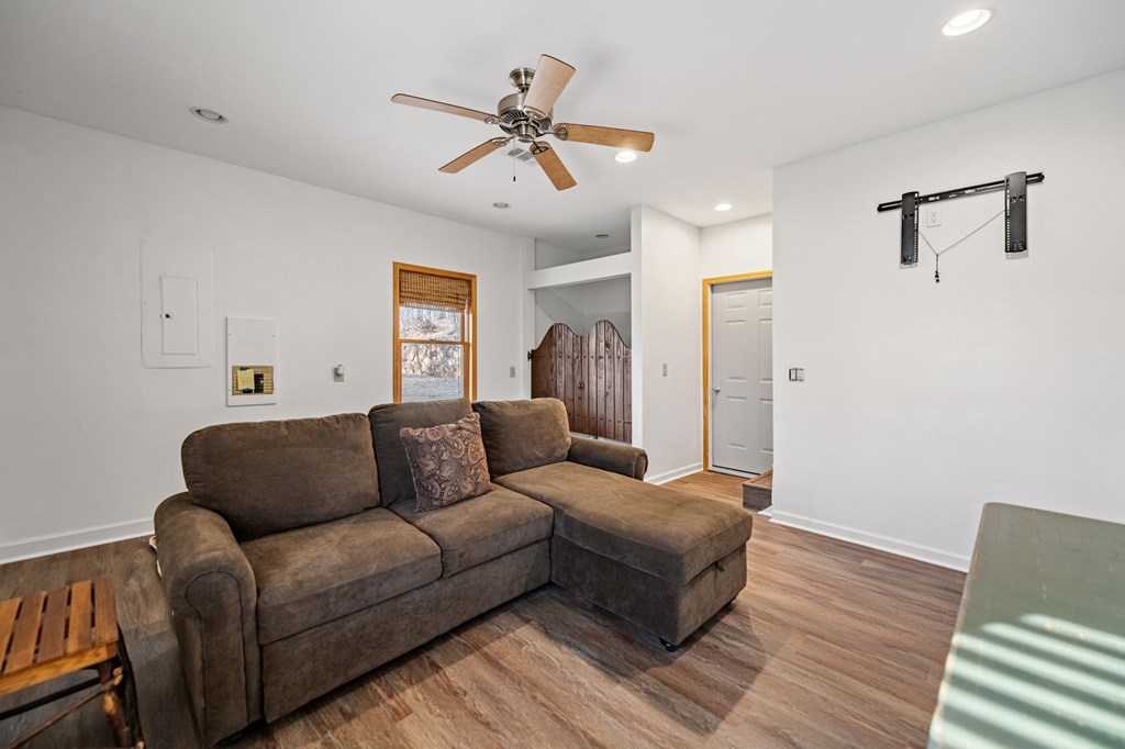 380 Oak Ridge Way Morganton, GA 30560 - Photo 42 of 67 a living room with furniture and a wooden floor