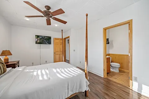 a view of a field with an ocean