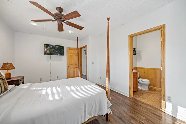 a view of a field with an ocean